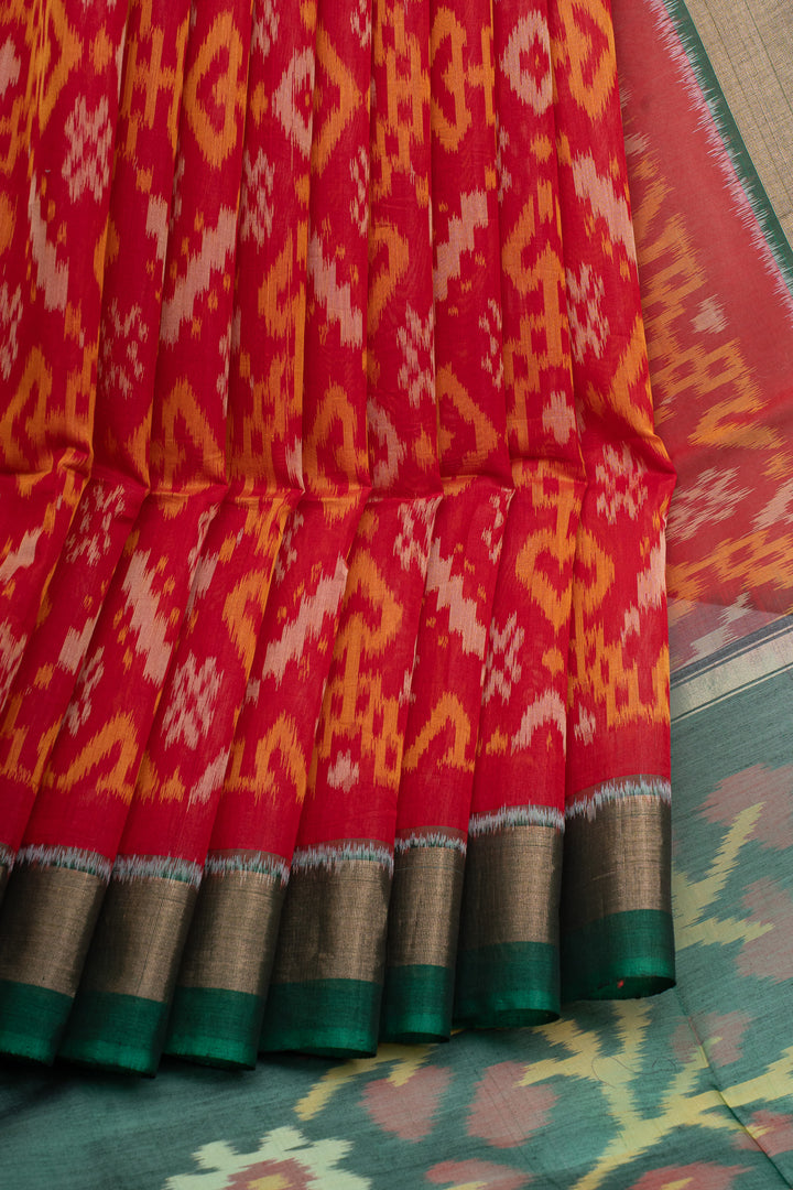 Red and green Ikat silk cotton saree