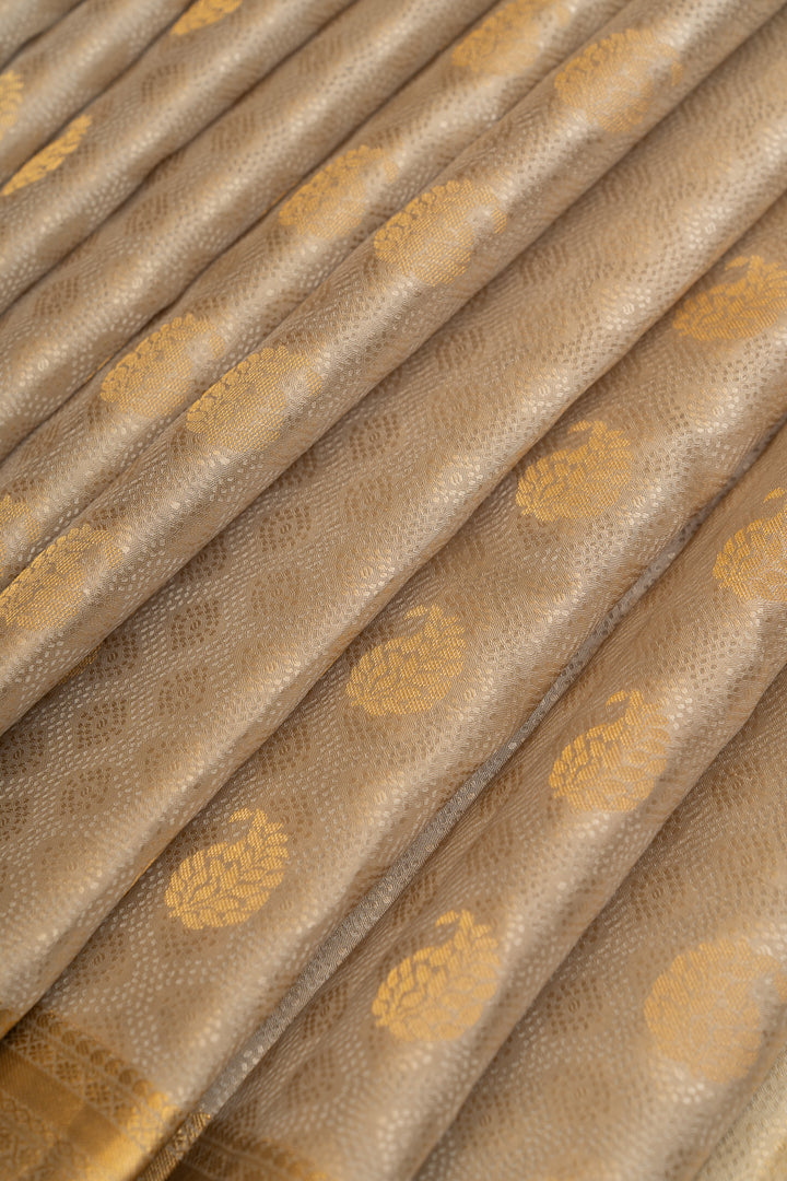 Greyish gold embossed pure Kanchipuram silk saree