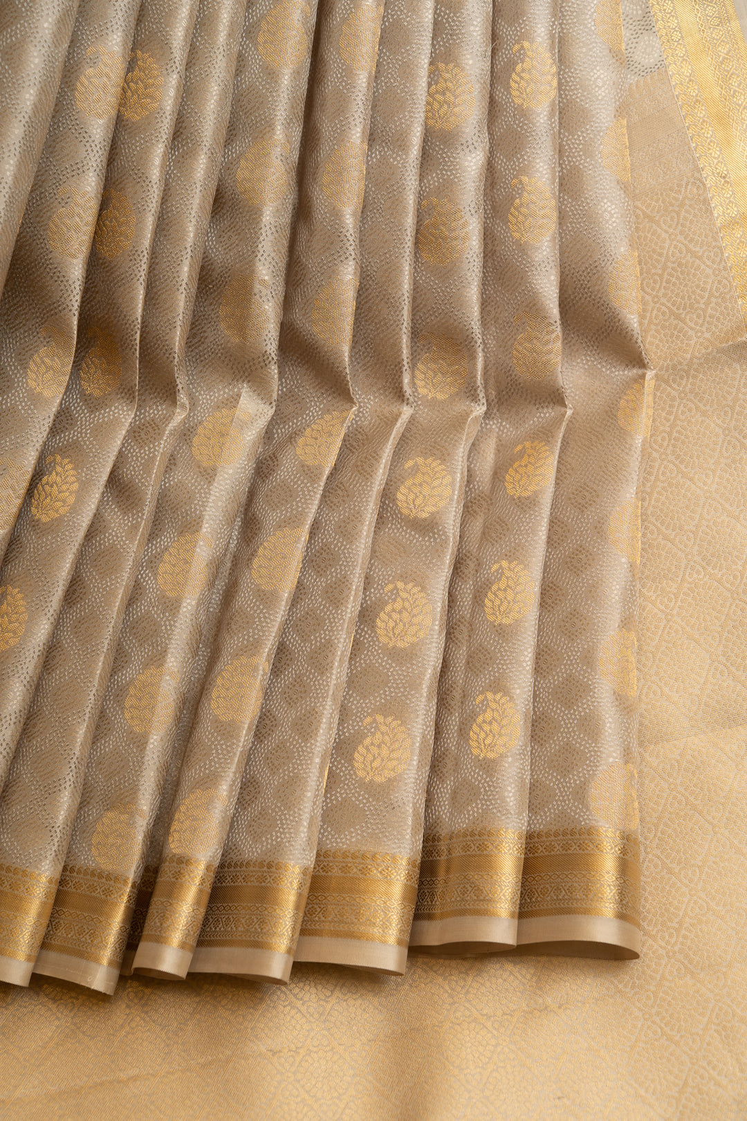 Greyish gold embossed pure Kanchipuram silk saree