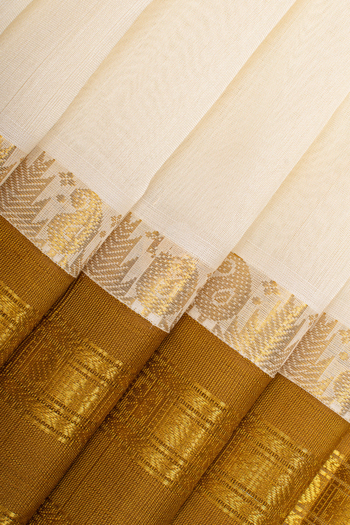 Off white and mustard pure silk cotton saree