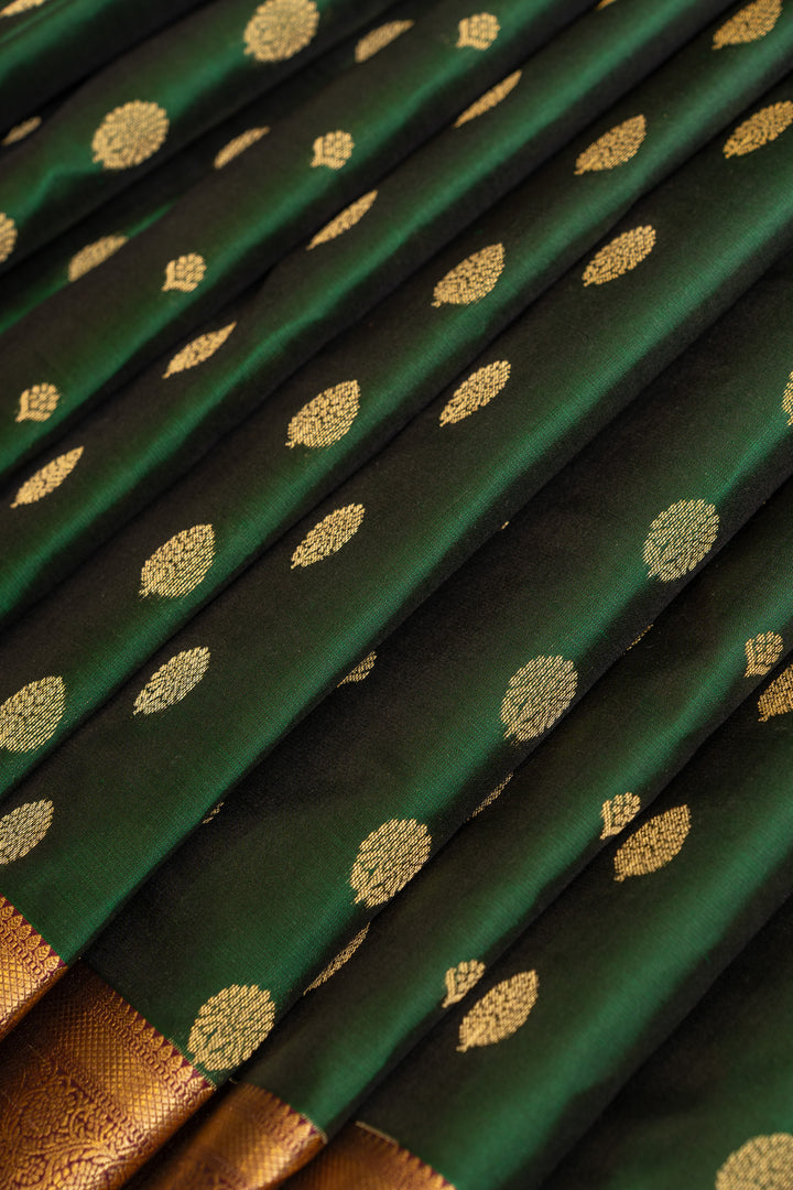 Bottle green buttis pure Kanchipuram silk saree
