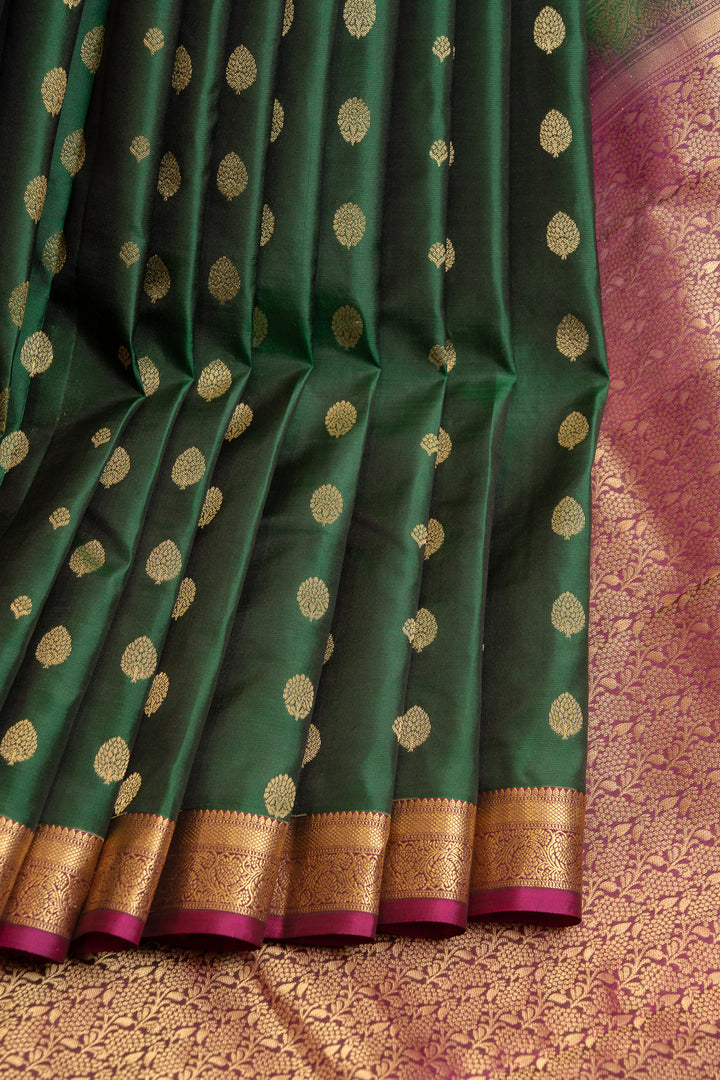 Bottle green buttis pure Kanchipuram silk saree