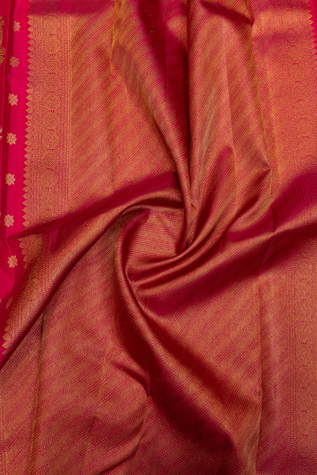 Reddish pink peacock motifs pure Kanchipuram silk saree