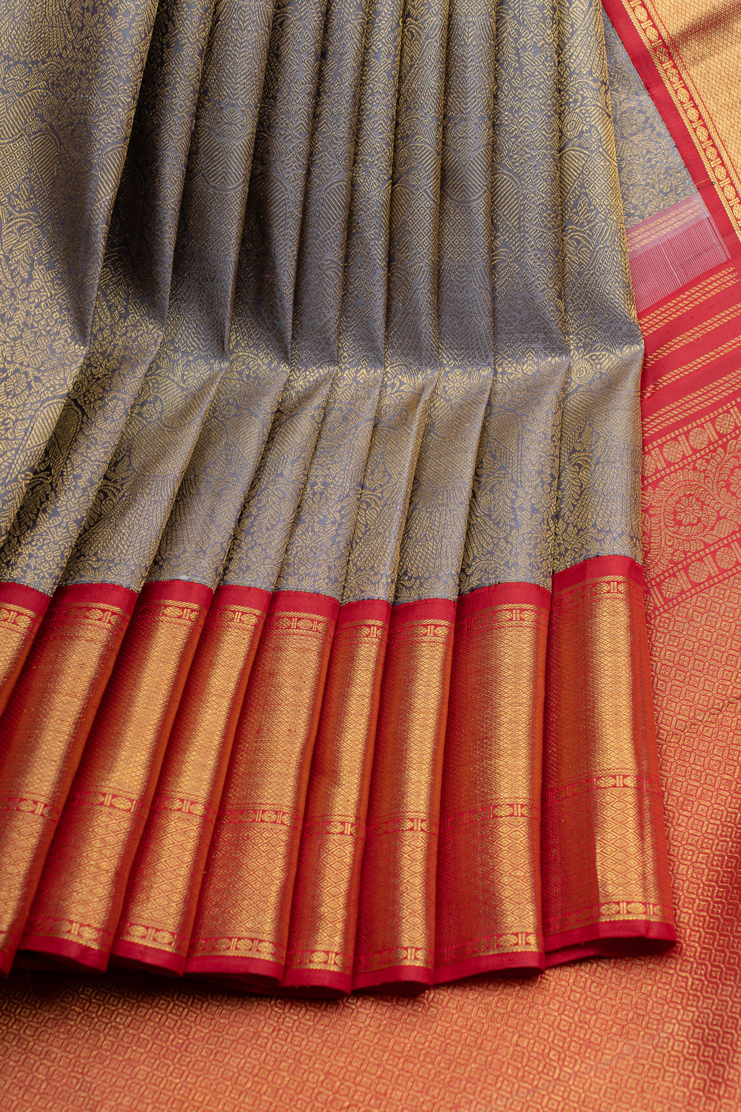 Greyish beige iruthalaipakshi brocade  pure  Kanchipuram silk saree