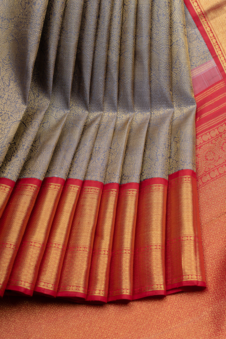 Greyish beige iruthalaipakshi brocade  pure  Kanchipuram silk saree