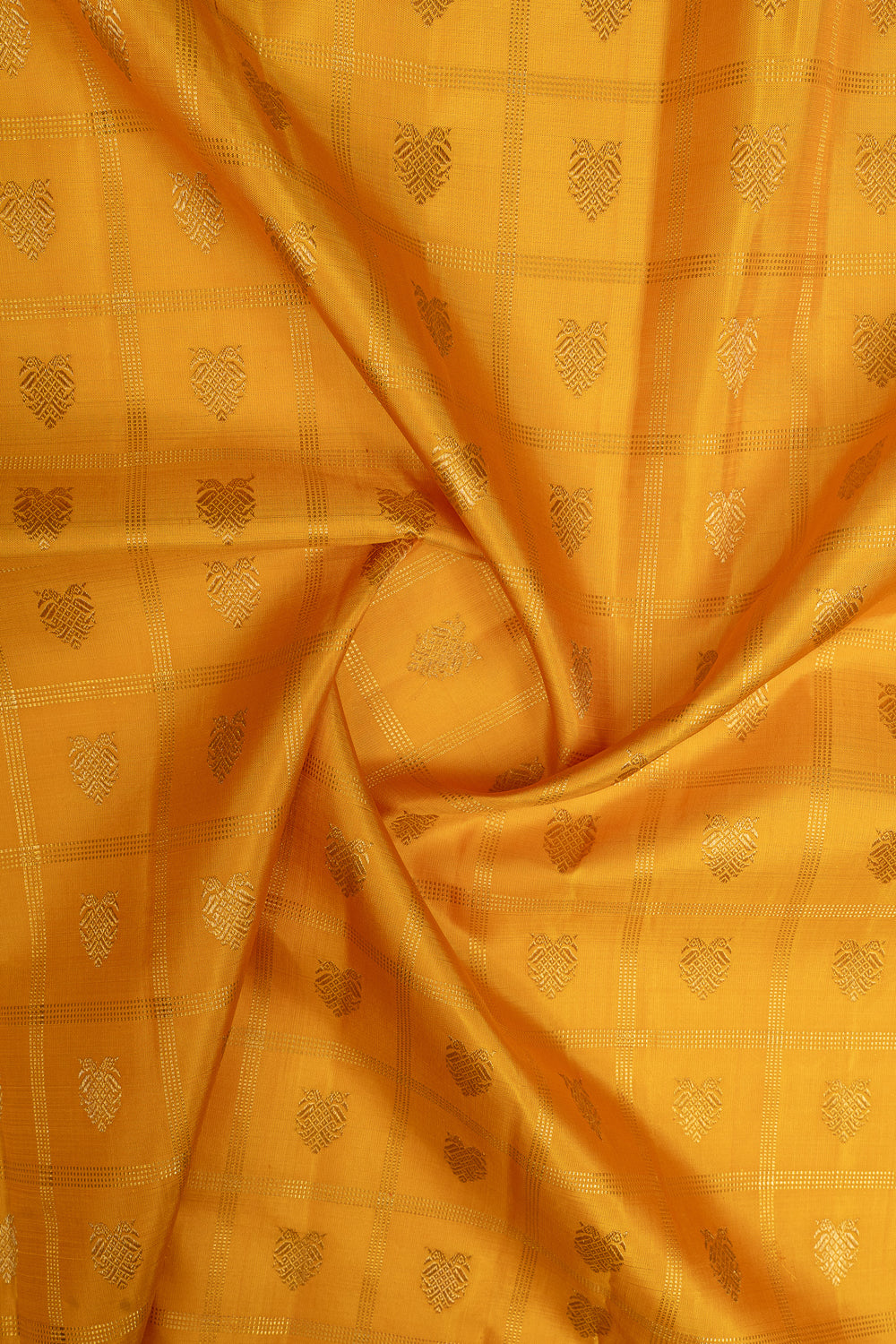 Golden yellow and purple iruthalaipakshi vintage checks pure kanchipuram silk saree