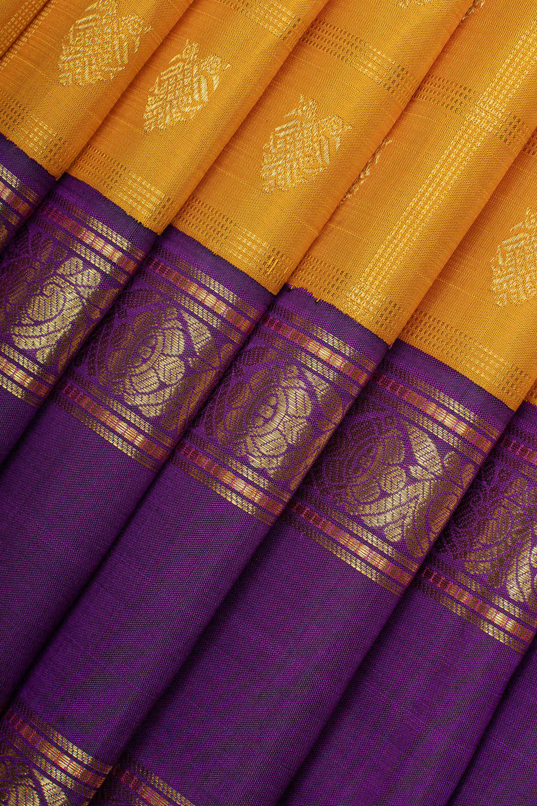 Golden yellow and purple iruthalaipakshi vintage checks pure kanchipuram silk saree
