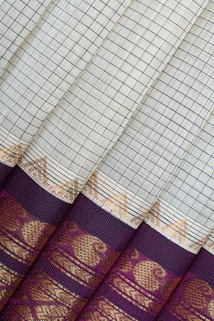 Off white and jamun purple checks pure silk cotton saree