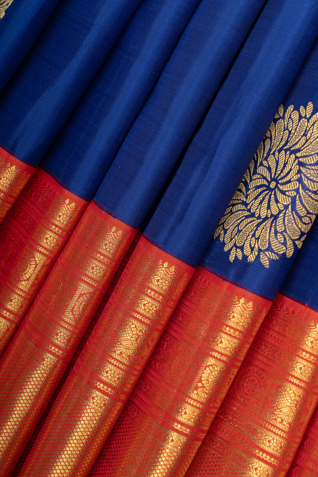 Royal blue and orange pure Kanchipuram silk saree