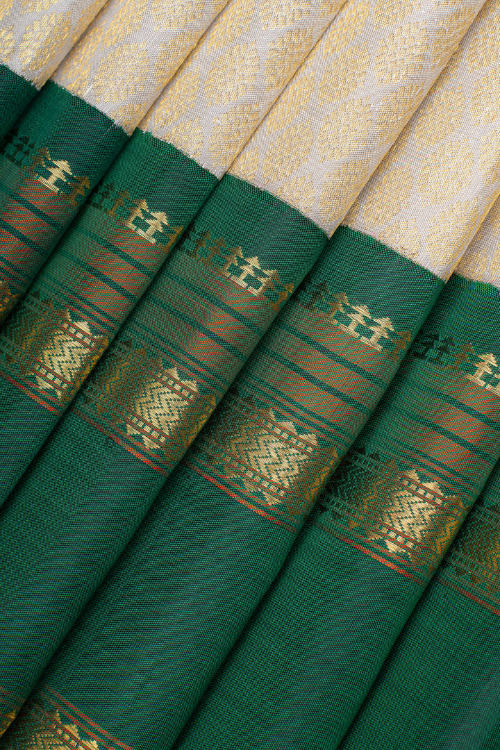 Ivory and green brocade pure kanchipuram silk saree