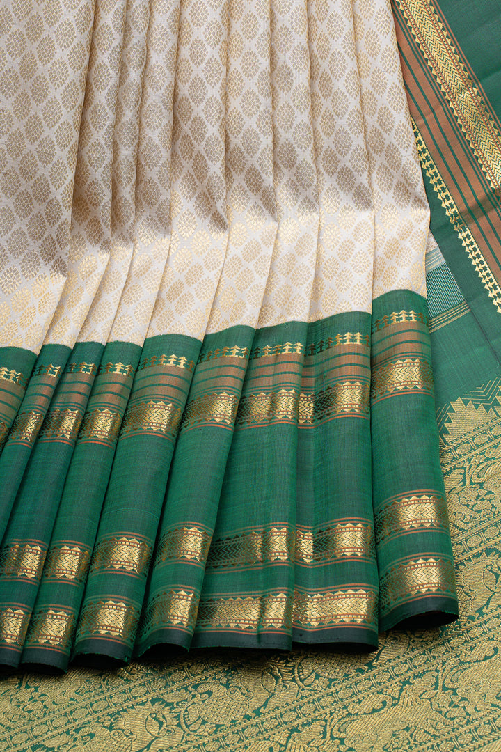 Ivory and green brocade pure kanchipuram silk saree