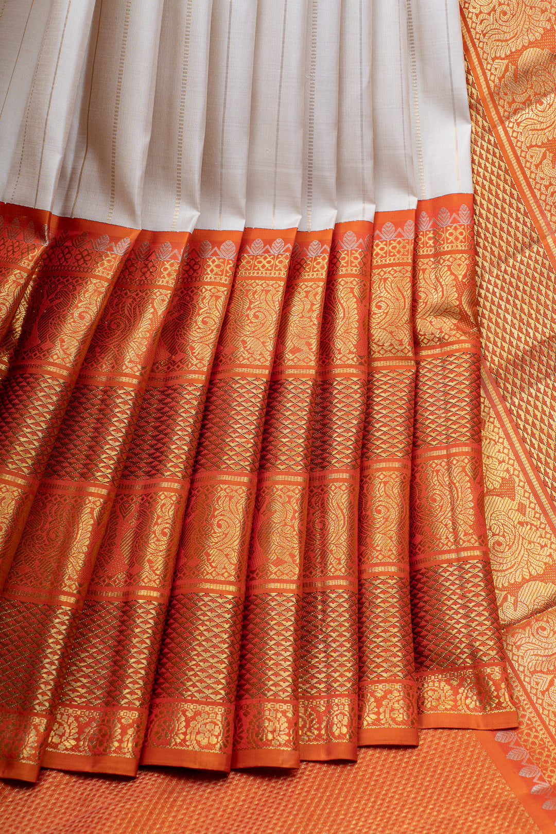 Ivory and rust orange grand borders pure  Kanchipuram silk saree