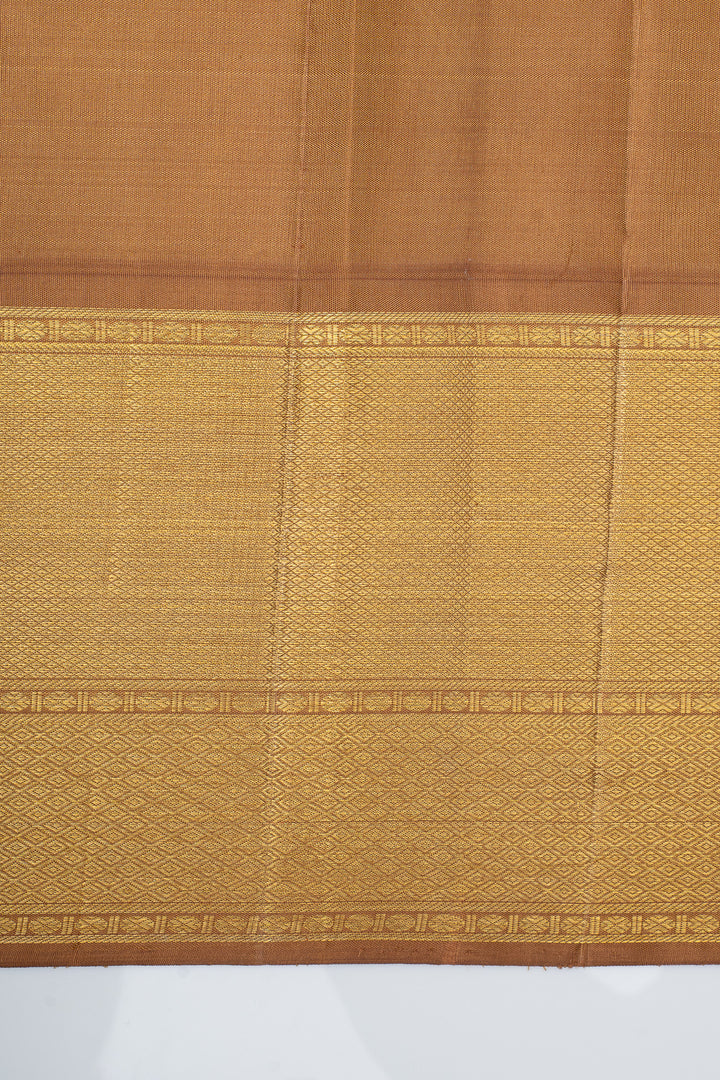 Champagne gold iruthalaipakshi brocade  pure kanchipuram silk saree