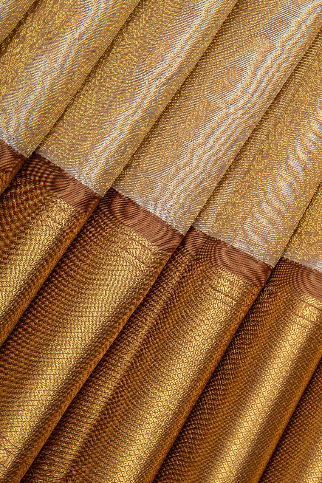 Champagne gold iruthalaipakshi brocade  pure kanchipuram silk saree
