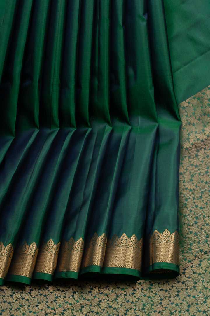 Peacock green small Border pure kanchipuram silk saree