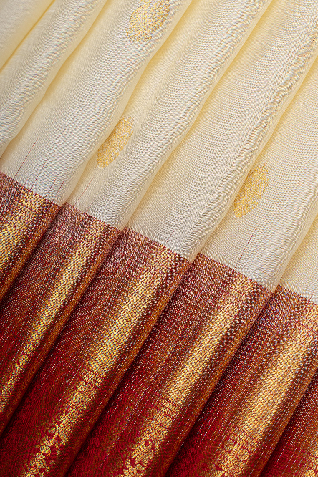 Ivory and red traditional pure kanchipuram silk saree