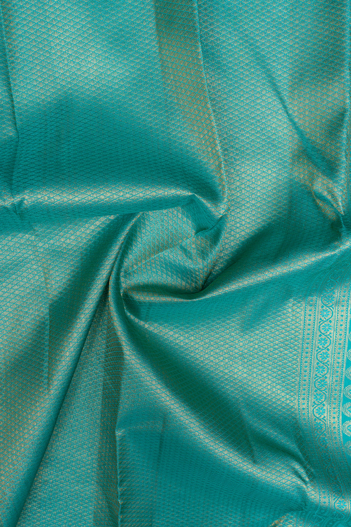 Mustard and teal brocade pure kanchipuram silk saree