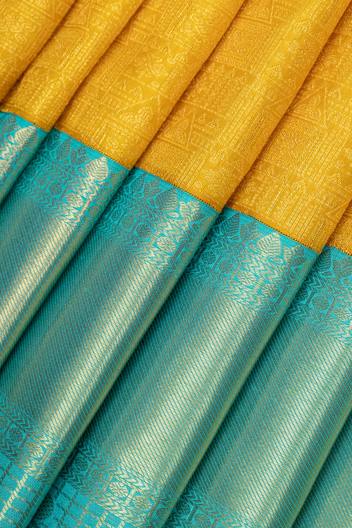 Mustard and teal brocade pure kanchipuram silk saree
