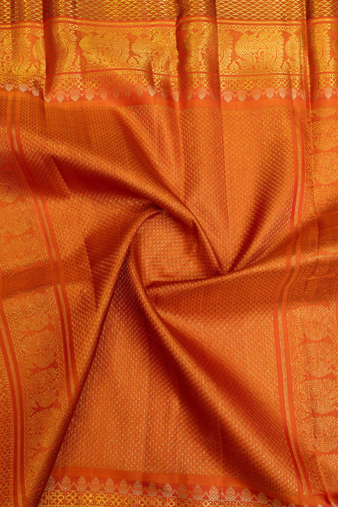 Champagne gold and rust orange grand borders pure Kanchipuram silk saree