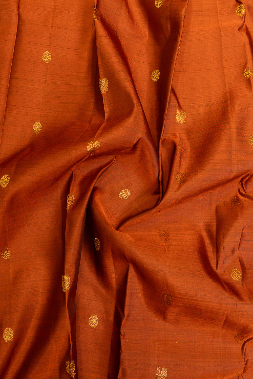 Rust orange turning border pure Kanchipuram silk saree