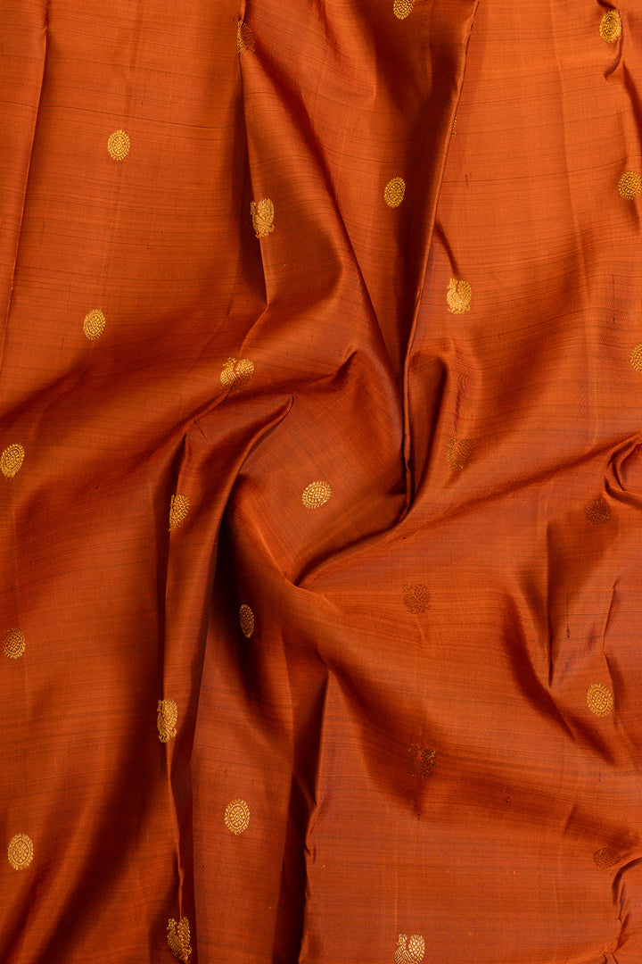 Rust orange turning border pure Kanchipuram silk saree