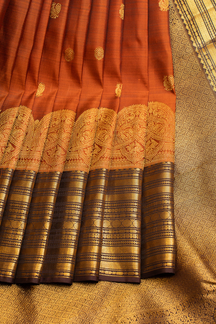Rust orange turning border pure Kanchipuram silk saree