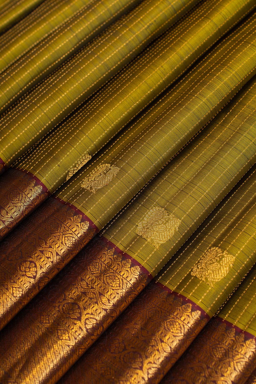 Mehndi green and jamun Zari stripes  pure Kanchipuram silk saree