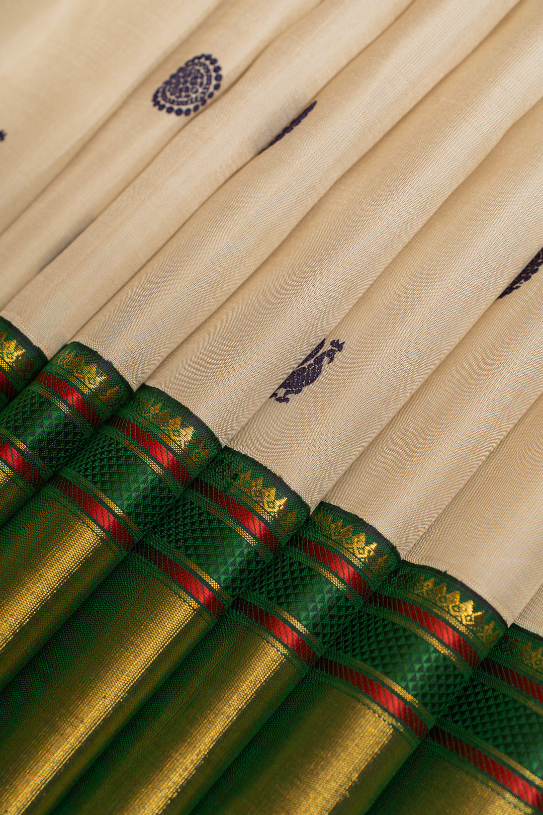 Off white and green thread motifs  pure Kanchipuram silk saree