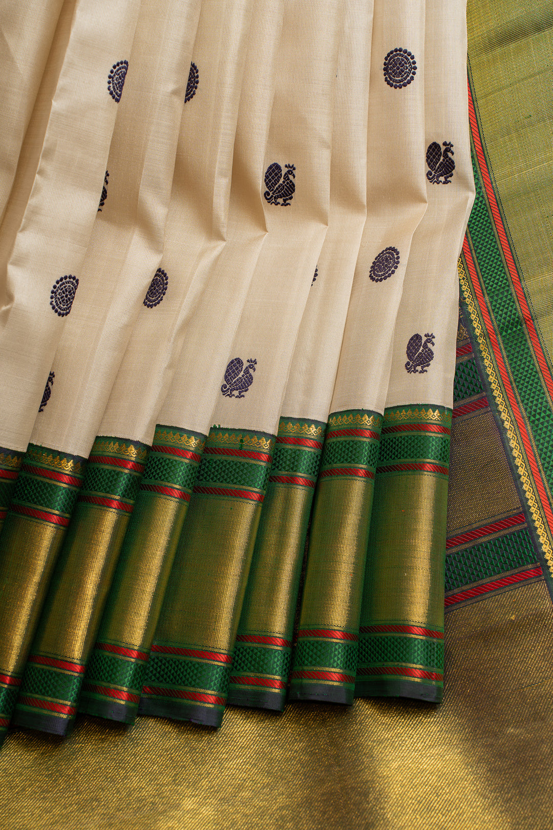 Off white and green thread motifs  pure Kanchipuram silk saree