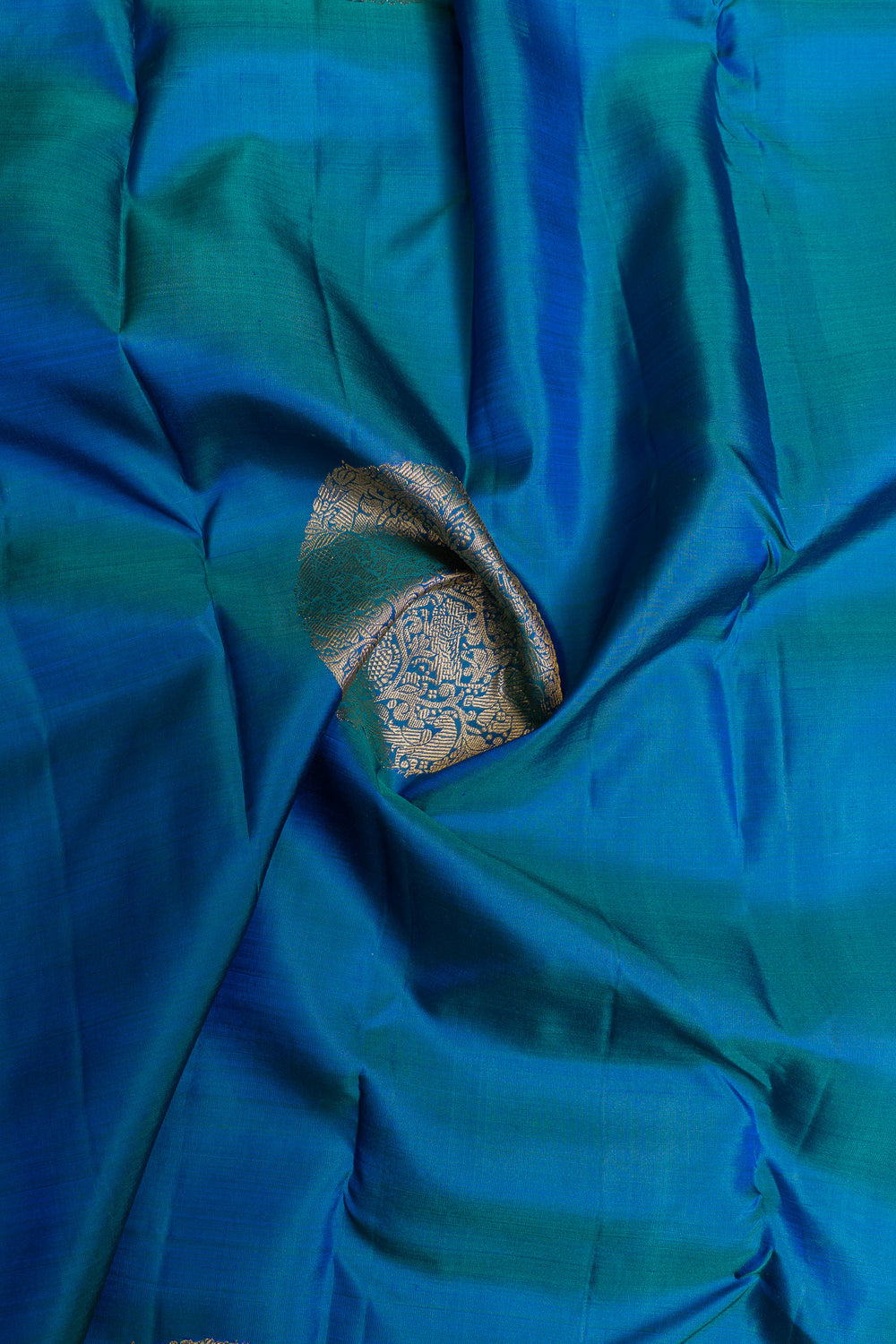 Peacock blue borderless pure Kanchipuram silk saree