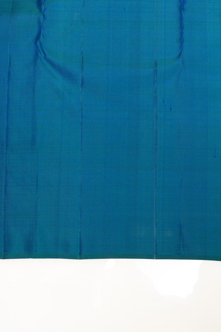 Peacock blue borderless pure Kanchipuram silk saree