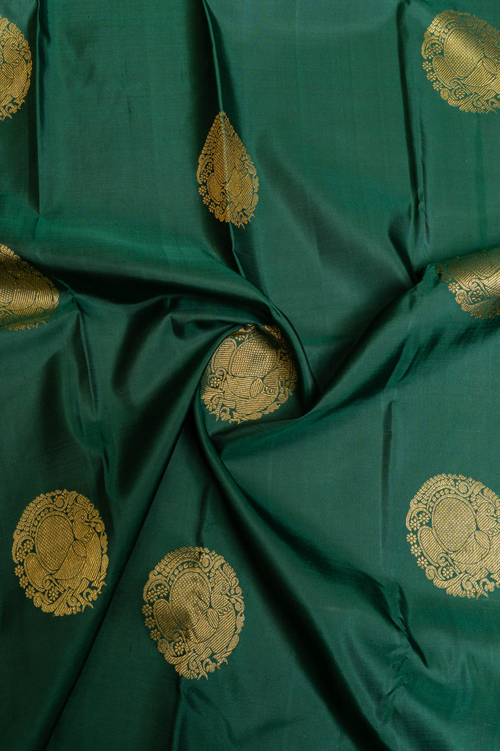 Pine green small border pure Kanchipuram silk saree