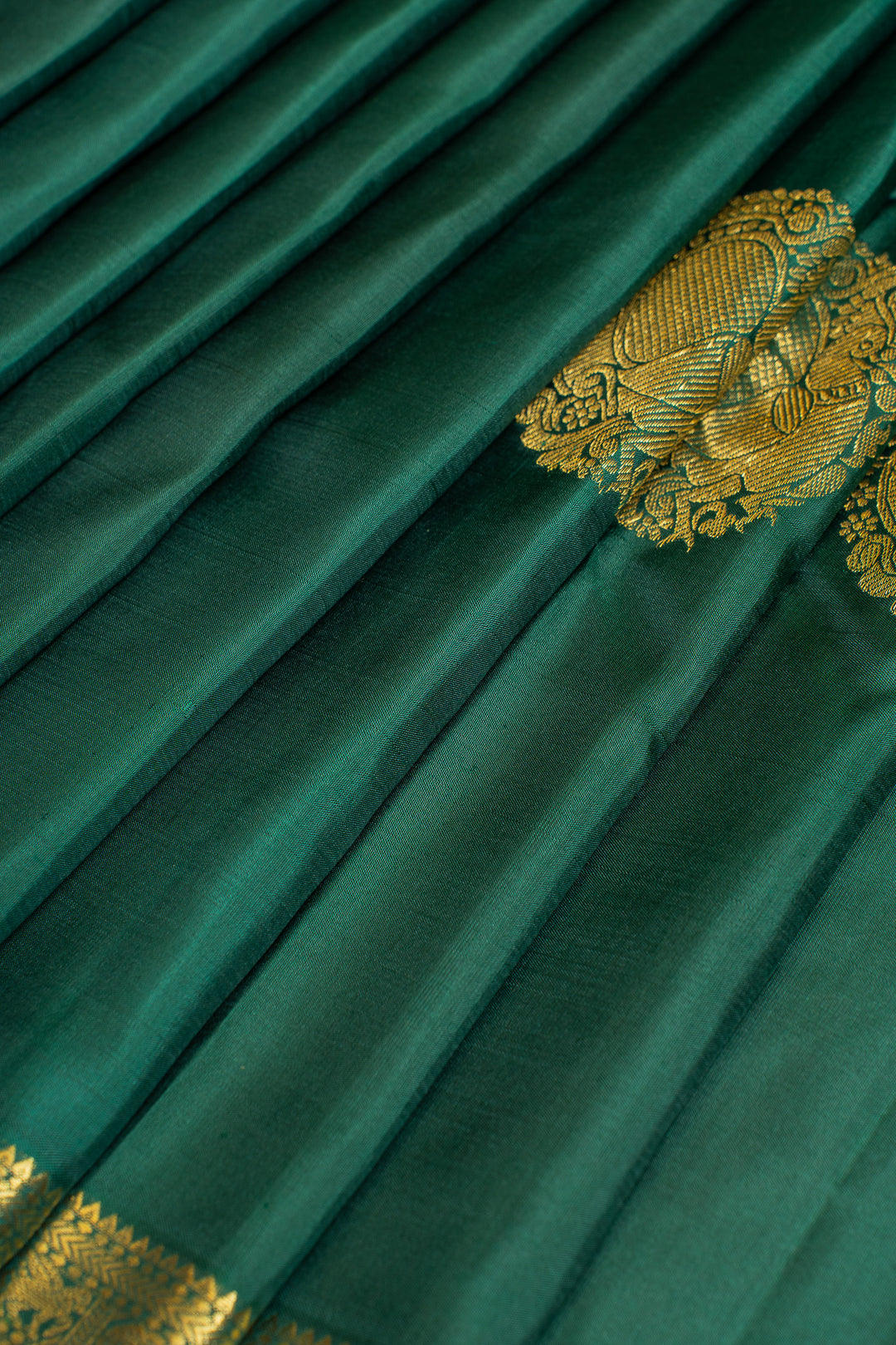 Pine green small border pure Kanchipuram silk saree