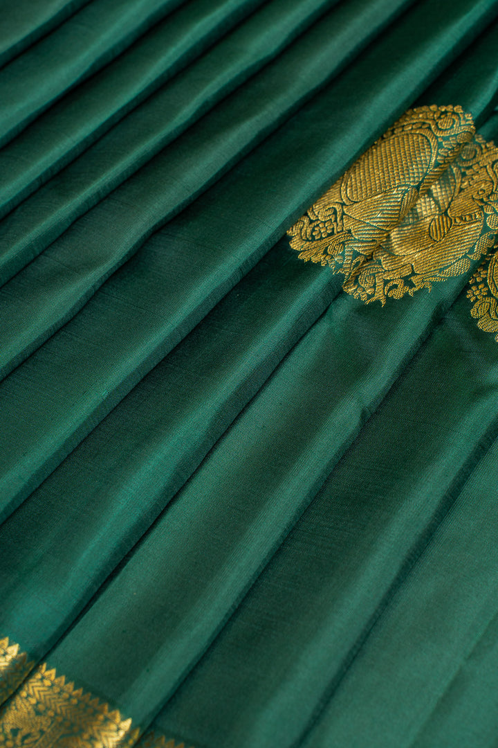 Pine green small border pure Kanchipuram silk saree