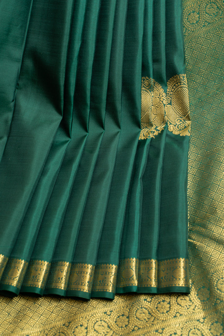 Pine green small border pure Kanchipuram silk saree