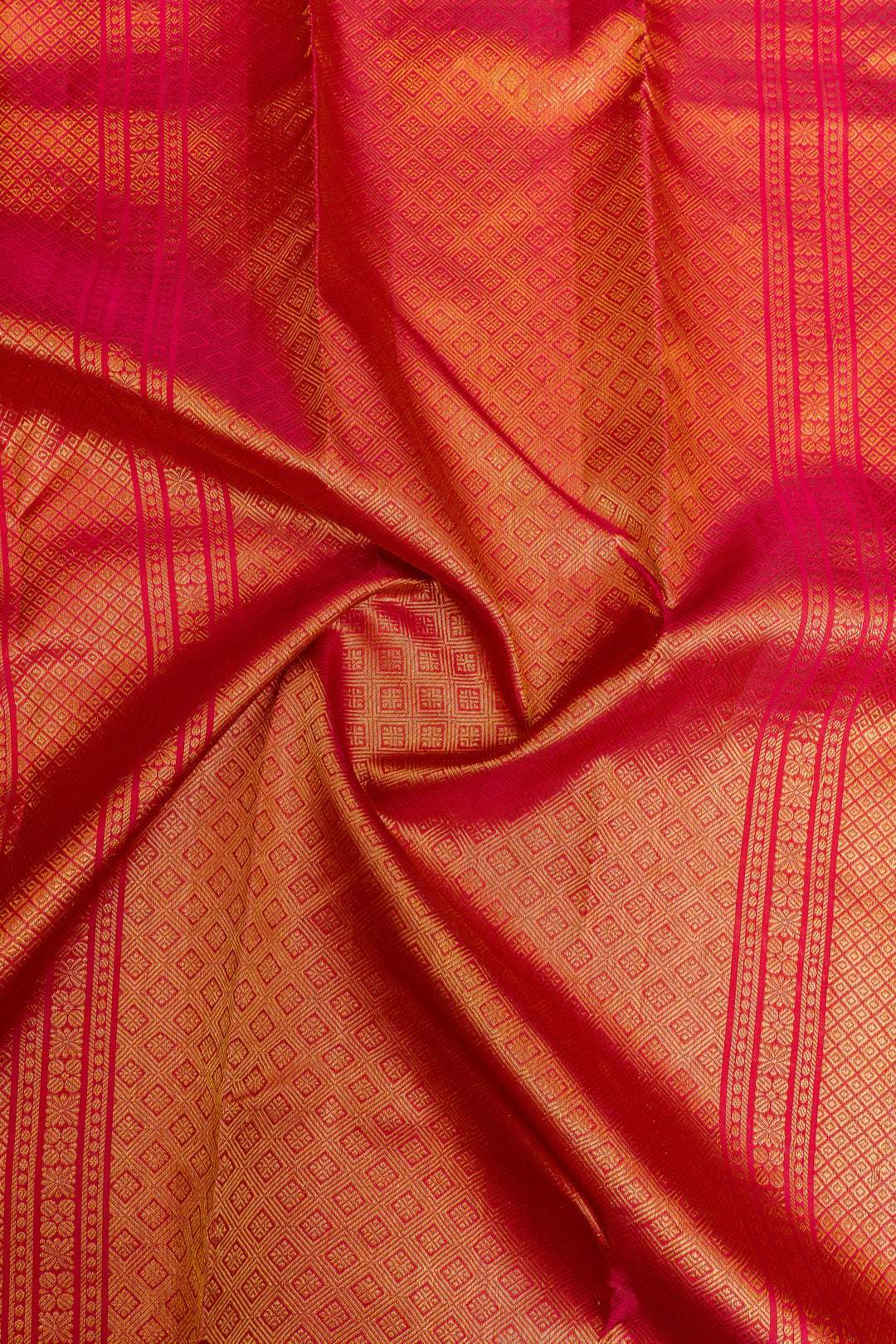 Reddish pink borderless pure Kanchipuram silk saree