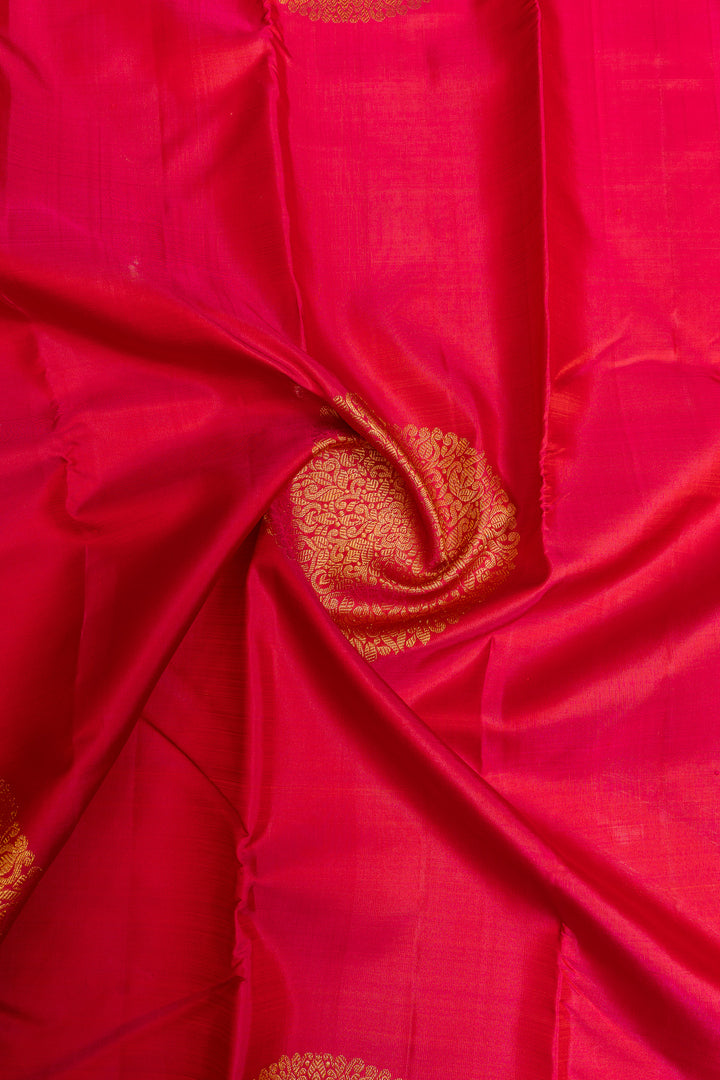 Reddish pink borderless pure Kanchipuram silk saree