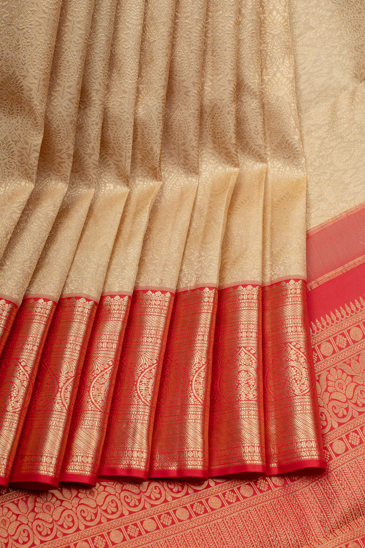 Champagne gold and red floral brocade pure kanchipuram silk saree