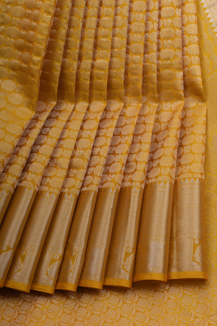 Golden yellow  brocade pure Kanchipuram silk saree