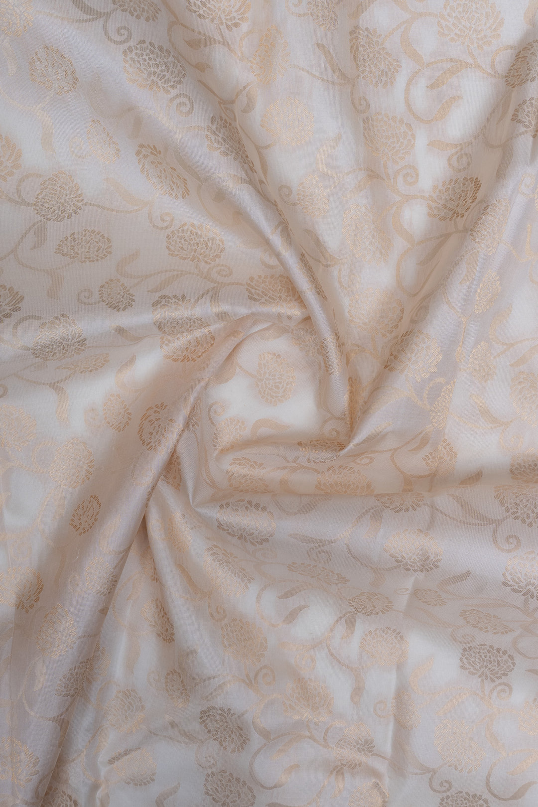 Ivory and gold floral brocade pure kanchipuram silk saree