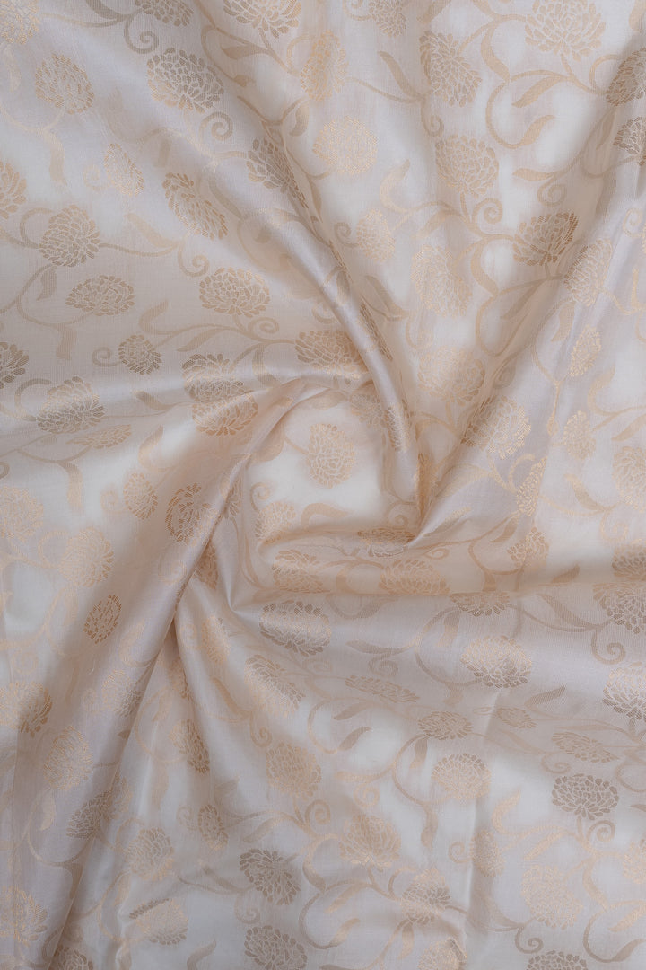 Ivory and gold floral brocade pure kanchipuram silk saree