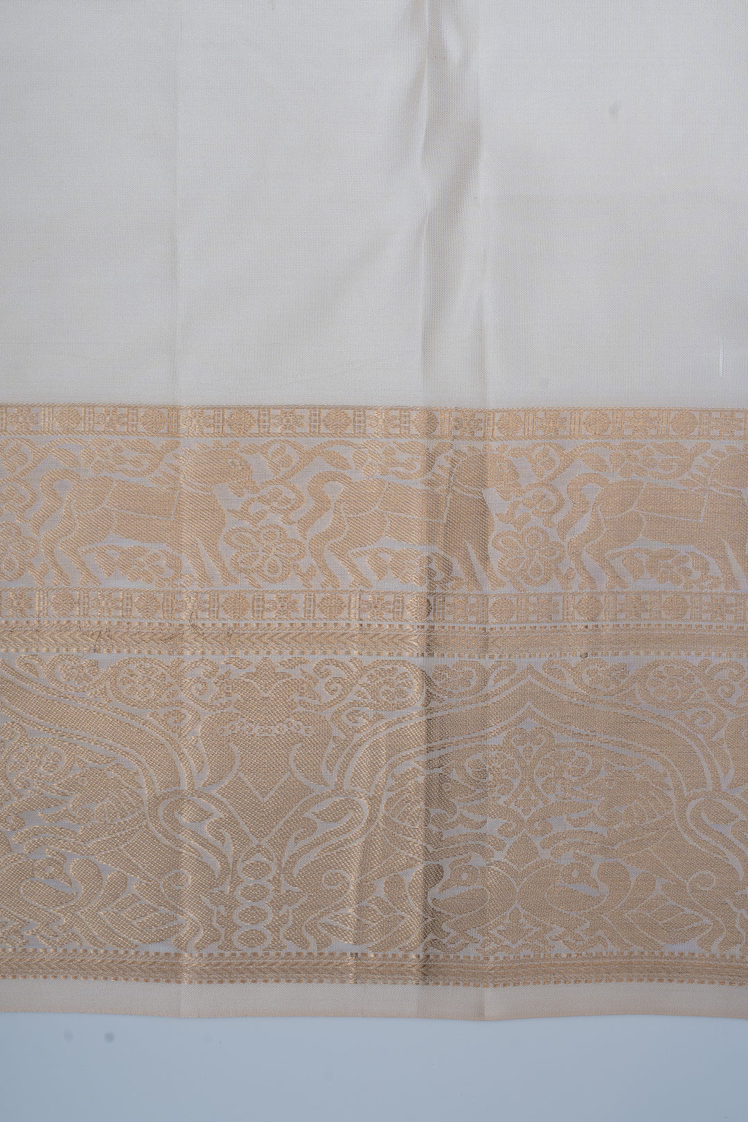 Ivory and gold floral brocade pure kanchipuram silk saree