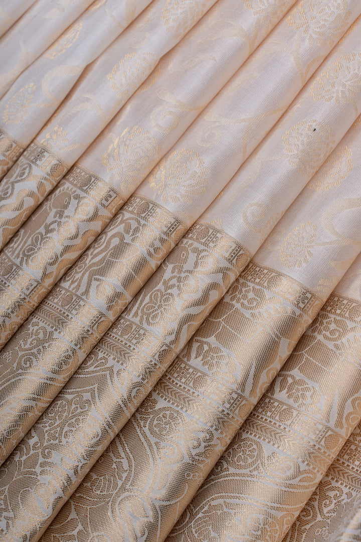 Ivory and gold floral brocade pure kanchipuram silk saree