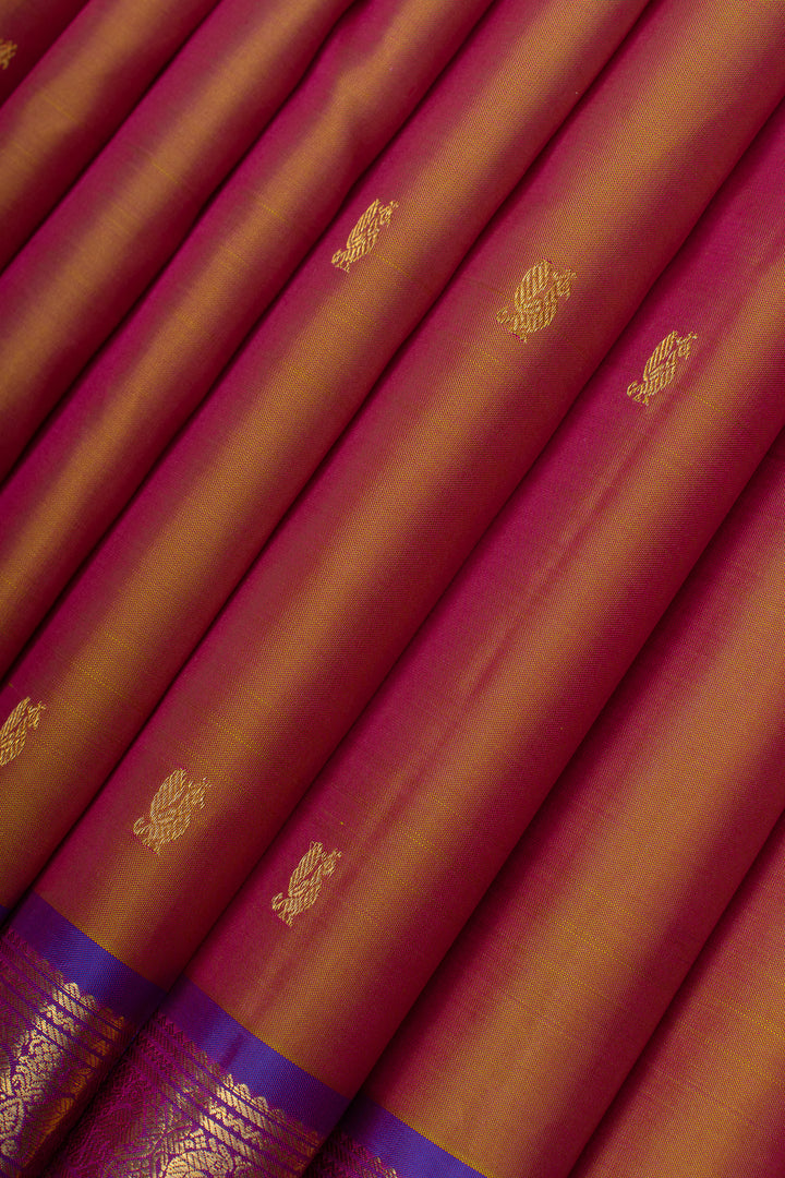 Rust orange and purple pure Kanchipuram silk saree