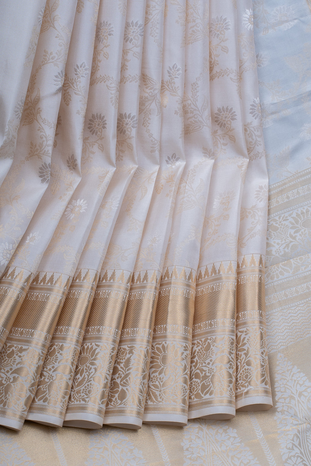 Ivory floral brocade pure kanchipuram silk saree
