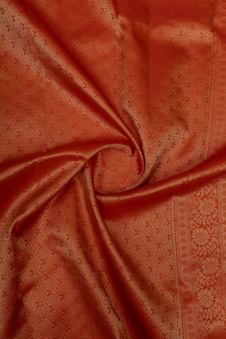 Reddish orange brocade pure Kanchipuram silk saree
