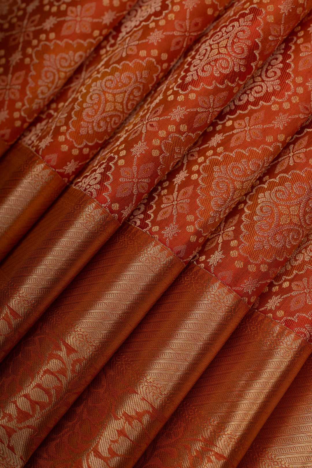 Reddish orange brocade pure Kanchipuram silk saree