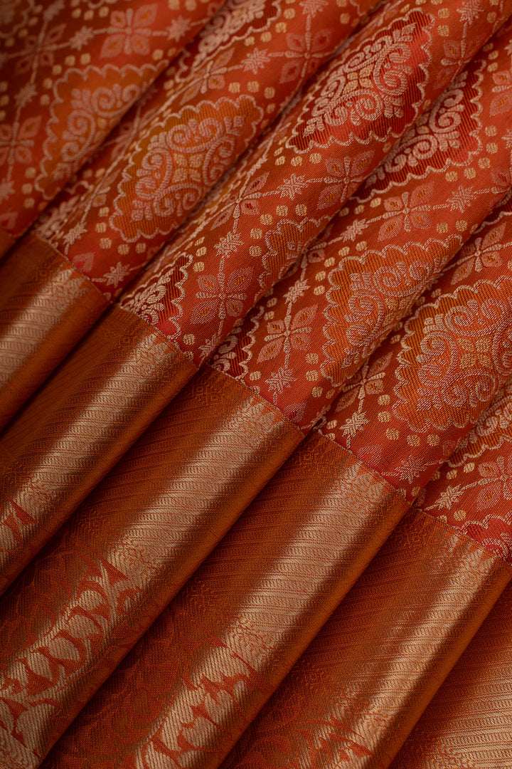 Reddish orange brocade pure Kanchipuram silk saree