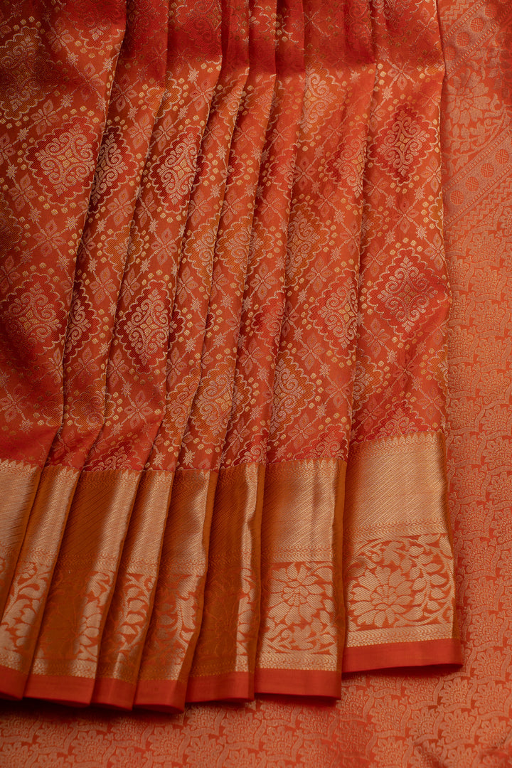 Reddish orange brocade pure Kanchipuram silk saree