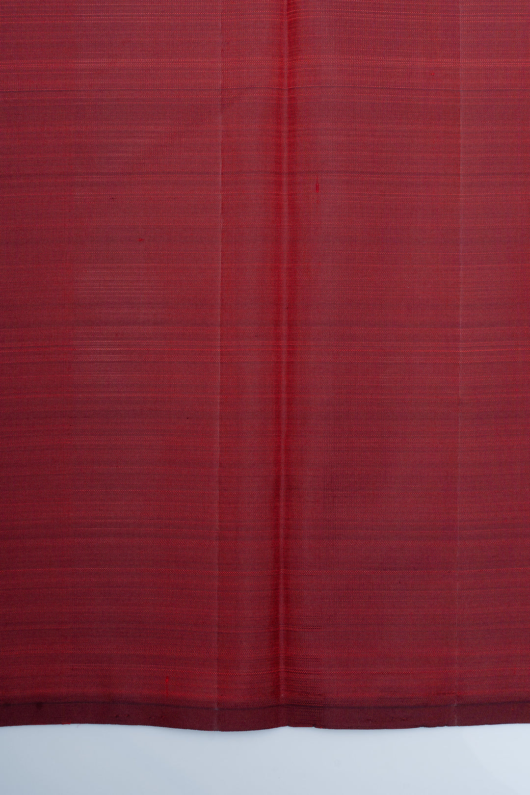 Maroon borderless pure Kanchipuram silk saree